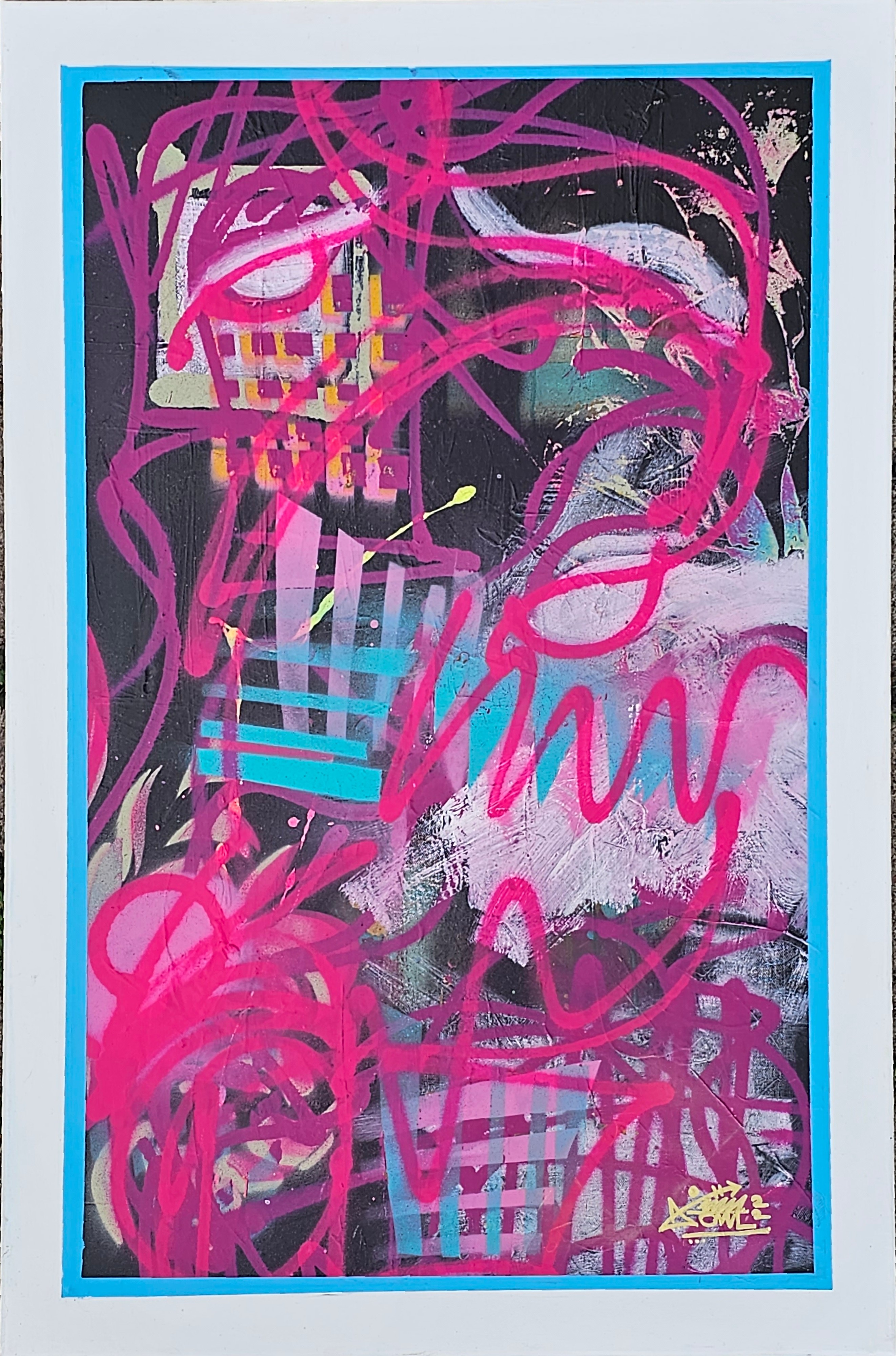 Hot pink spray-painted skull on black background with blue border and graffiti tag by Michael MacDonald