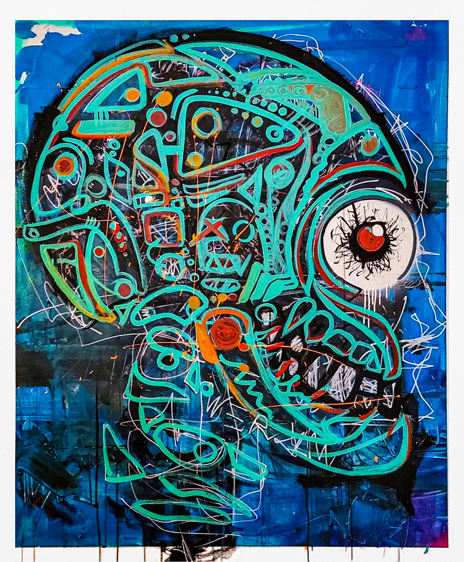 Large teal-outlined skull with red eye on deep blue background filled with abstract symbols by Michael MacDonald