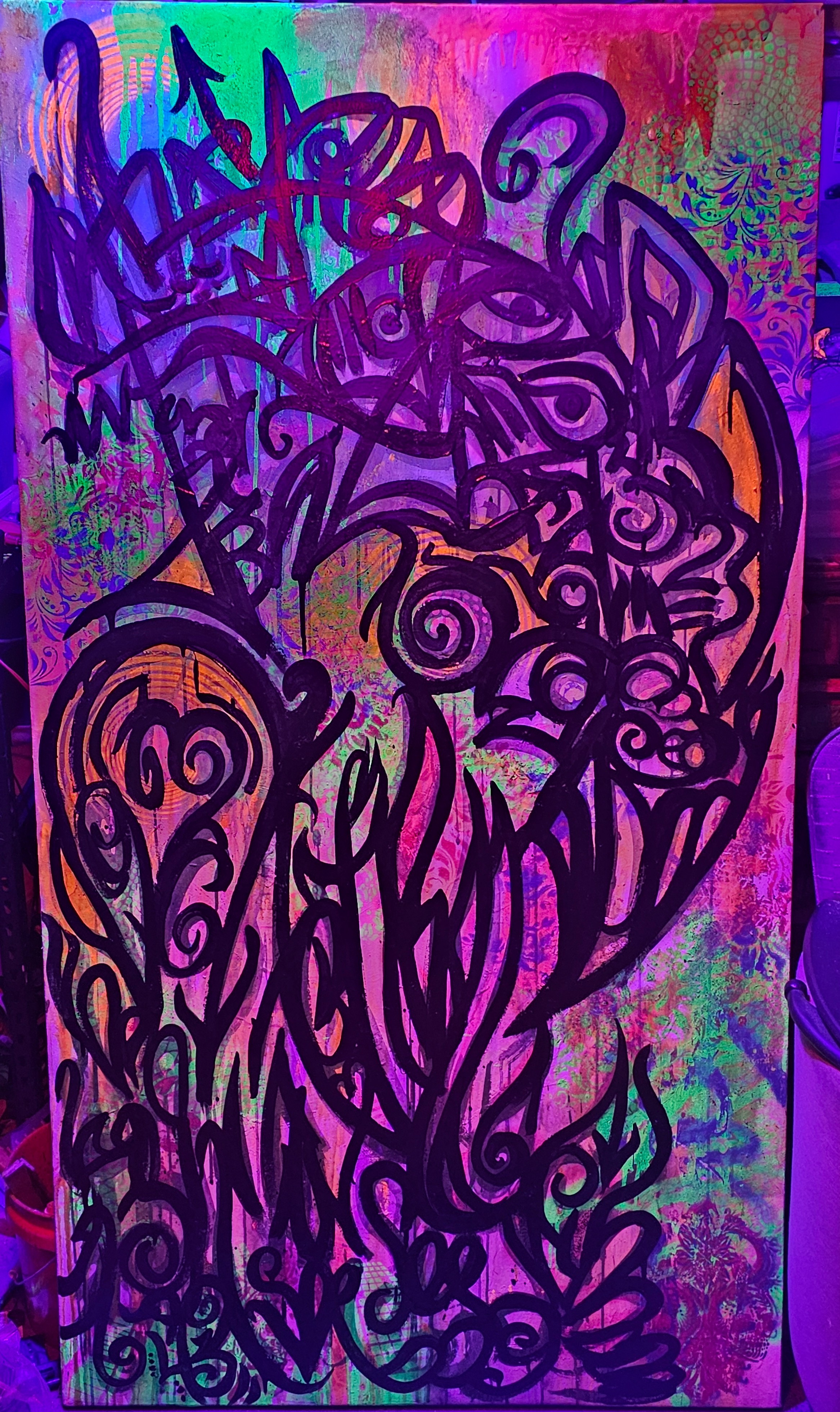 UV blacklight painting of interlocking beast faces in purple continuous line over fluorescent mandala ground by Michael MacDonald